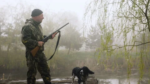 Hunter hunts down target and targets it Stock Footage 196619503