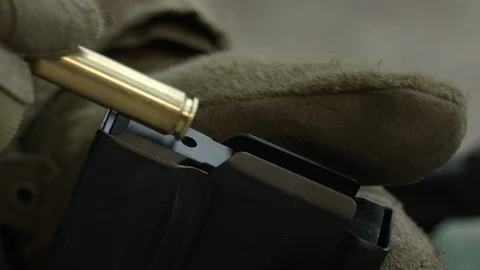 Hunter load ammo. Slow Motion. Close-up hands. Hunting. Stock-Footage 107123454