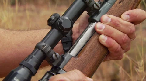 Hunter loading rifle Stock-Footage 54591142