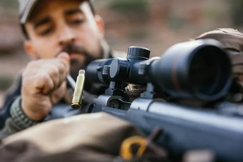 Hunter loading rifle with scope for hunt Stock Photos