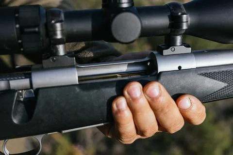 Hunter loading rifle with scope for hunt Stock Photos