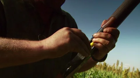 Hunter loading shells in shotgun Stock Footage 54591812