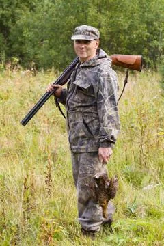 The hunter looks around Stock Photos