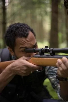 Hunter man in the forest Foto stock