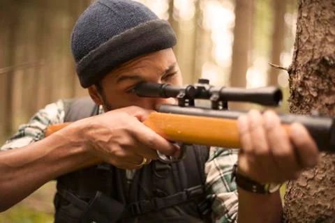Hunter man in the forest Stock Photos
