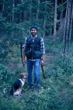 Hunter man in the forest Stock Photos