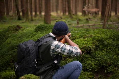 Hunter man in the forest Stock Photos