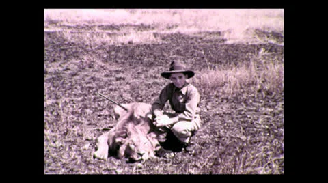 Hunter posing with lion kill 2, Tanzania 1937 動画素材 27149307