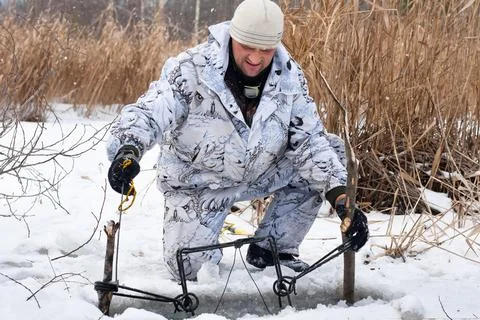 Hunter putting a trap Stock Photos