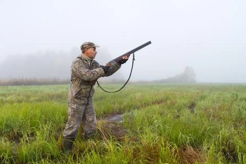 The hunter is ready to fire Stock Photos