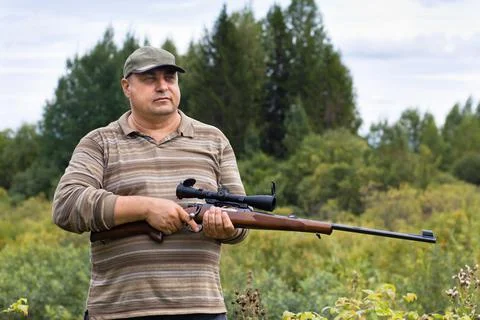 Hunter with a rifle Stock Photos