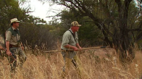 Hunter shooting animal in ranch Stock Footage 54591121