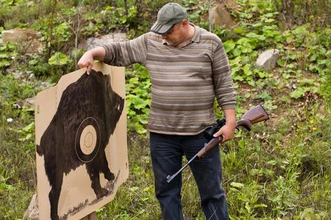 Hunter with shooting target Stock Photos