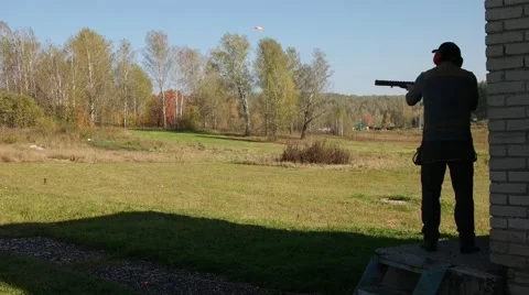 Hunter shoots double plate target. Slow motion. Stock-Footage 68492882