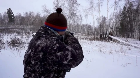 Hunter shoots a gun Stock Footage 103086353