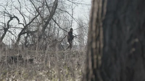 Hunter sneaks Stock Footage 231908594
