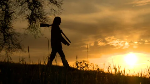 Hunter at sunset 03 HD Stock Footage 22800468