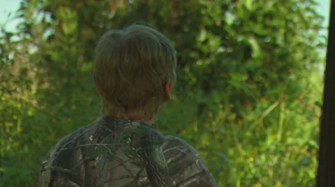 Hunter taking aim and shooting while dove hunting Stock Footage 54591673