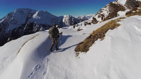 Hunter tramping fly over. Stock Footage 49829981