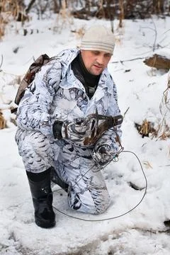 Hunter with a trap in hands Stock Photos