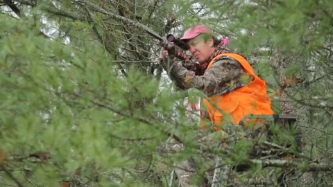Hunter on Tree Stand Aiming Gun 動画素材 172263585