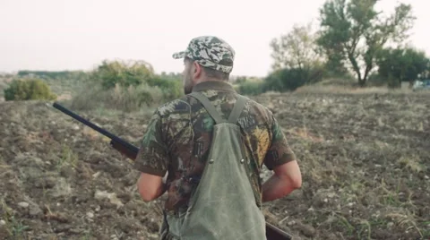 Hunter walks on the countryside Stock-Footage 54737099