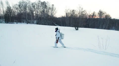 Hunter in the winter in the forest Stock Footage 169383110