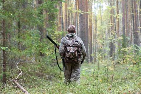 Hunter in the woods Stock Photos