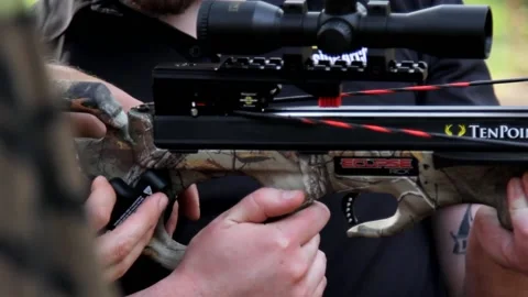 Hunters loading a crossbow for hunting Stock Footage 171996581