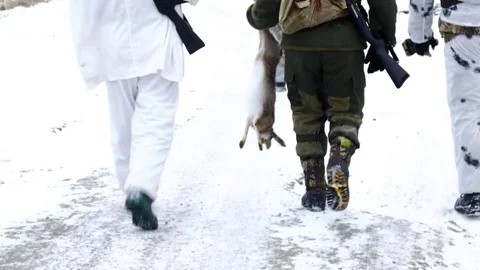 Hunters return with prey 스톡 동영상 78926327