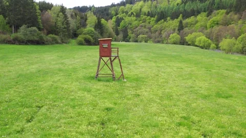 A hunting perch in a lush spring landscape Stock-Footage 155296012