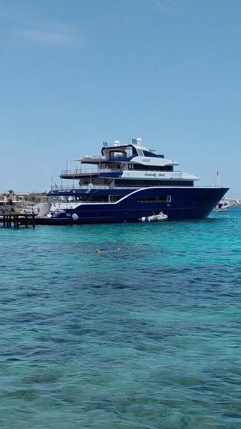 Hurghada, Egypt - May 2 2026: luxury yacht moored at a pier Stock Footage 336215735
