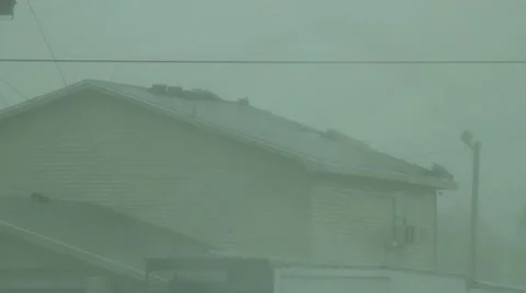 Hurricane assaults a roof Stock Footage 12674119