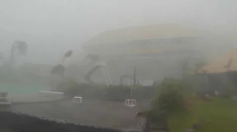 Hurricane comes ashore Extreme Wind across a resort Stock Footage 33871347