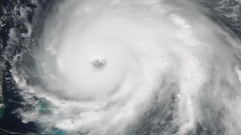 Hurricane Dorian over land causing destruction slow zoom Stock Footage 150988627