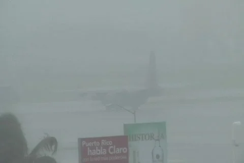 Hurricane Earl - C130 plane awaits for takeoff during storm with audio Stock Footage