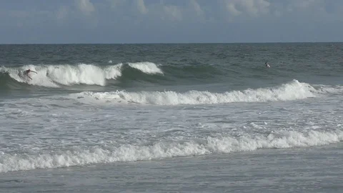 Hurricane Florence Pre-Landfall Surfer Wipes Out Stock Footage 112998310