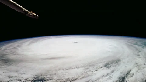 Hurricane Florence as seen from STS-66 shuttle Atlantis 1994 zoom out Stock Footage 238509455