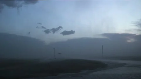 Hurricane force thunderstorm winds along Kansas highway Stock Footage 234016525