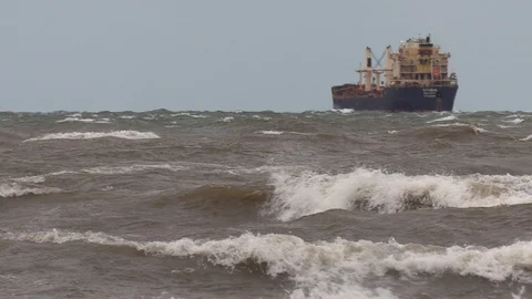 Hurricane force wind and waves as tropical storm approaches shipping lanes Stock Footage 94808394