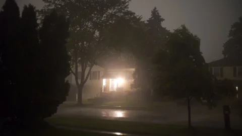 HURRICANE. Hard Rain whit thunder in the night with lightning in the suburbs Stock Footage 115425527