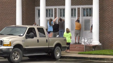 Hurricane Michael boarding up Stock Footage 96440977
