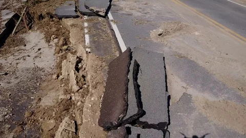 Hurricane Michael Damage Collapsed Road US 98 closeup Pavement Pieces Florida Stock Footage 97541315