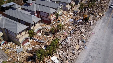 Hurricane Michael Damage Debris Clearing Backhoe Mexico Beach Florida Video stock 97390686