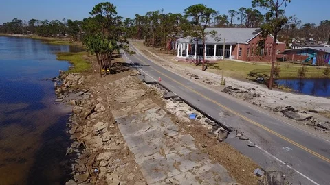 Hurricane Michael Damage Road Collapsed US 98 aerial ascent Florida Stock Footage 97457029