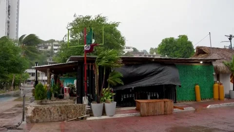 Hurricane Polo triggers massive panic buying and heavy rains in Acapulco, Mexico Video stock 346264732