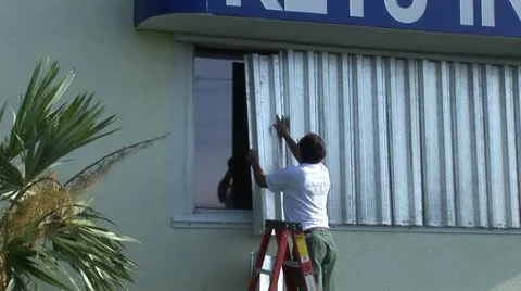 Hurricane shutters preparation 库存影片 12574617