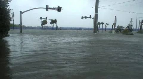 Hurricane storm surge floods an intersection Stock Footage 12576947