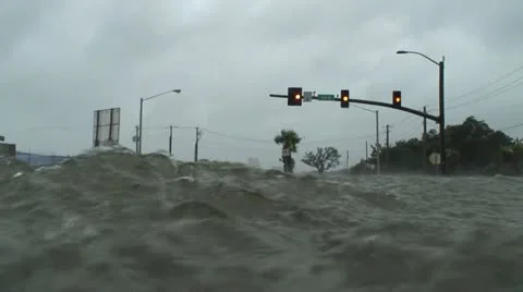 Hurricane storm surge floods an intersection 库存影片 12577641