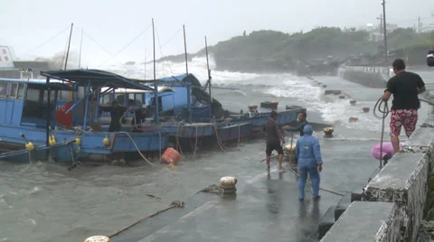 Hurricane Storm Surge Lashes Port Fishermen Try To Save Boats Stock Footage